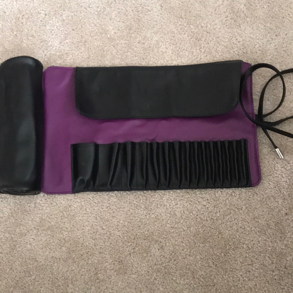 Brush roll makeup brush holder.